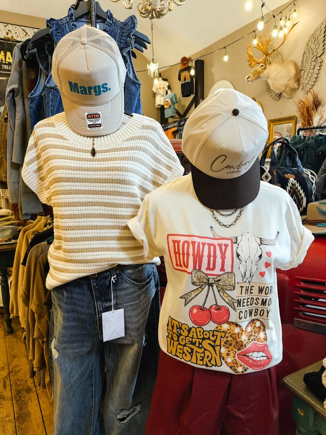 Graphic tees and caps displayed in the Waynesville shop