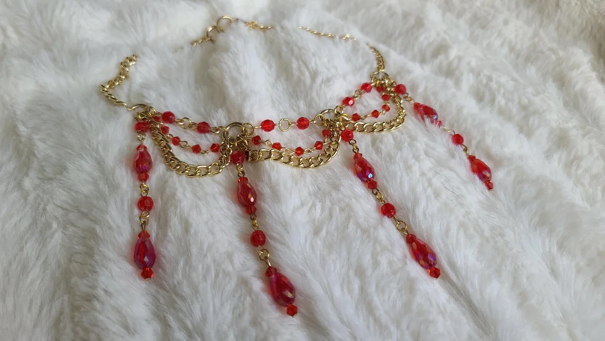Red and gold layered chain necklace