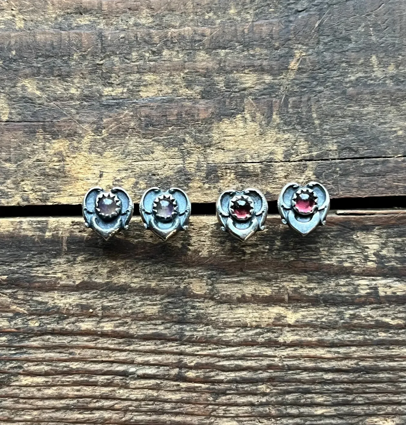 Heart filled gemstone earrings