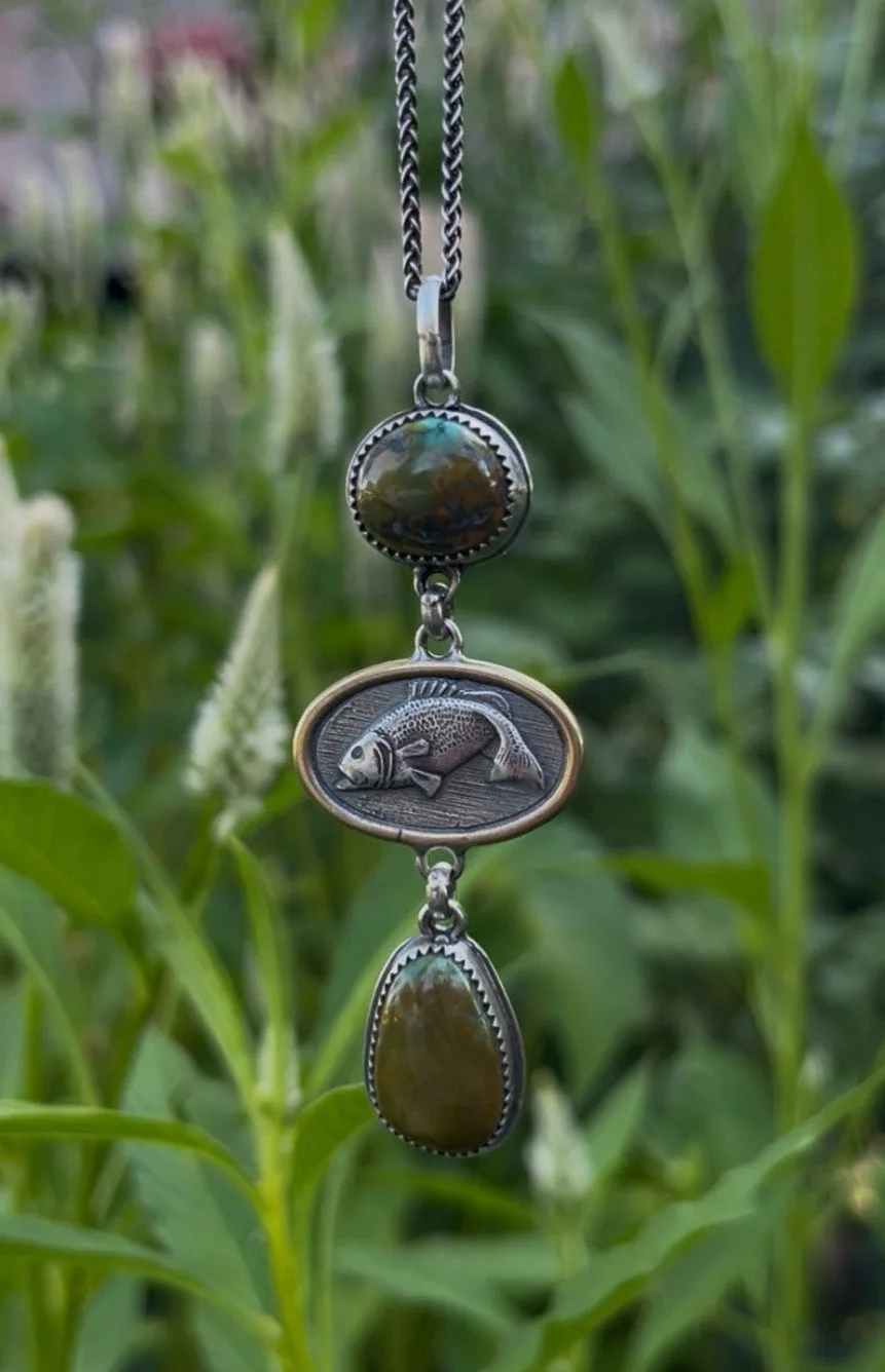 Troy Springs turquoise framed fish pendant