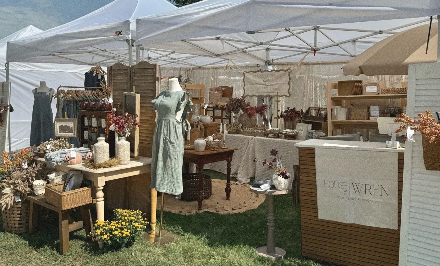 The House of Wren tent at an outdoor market