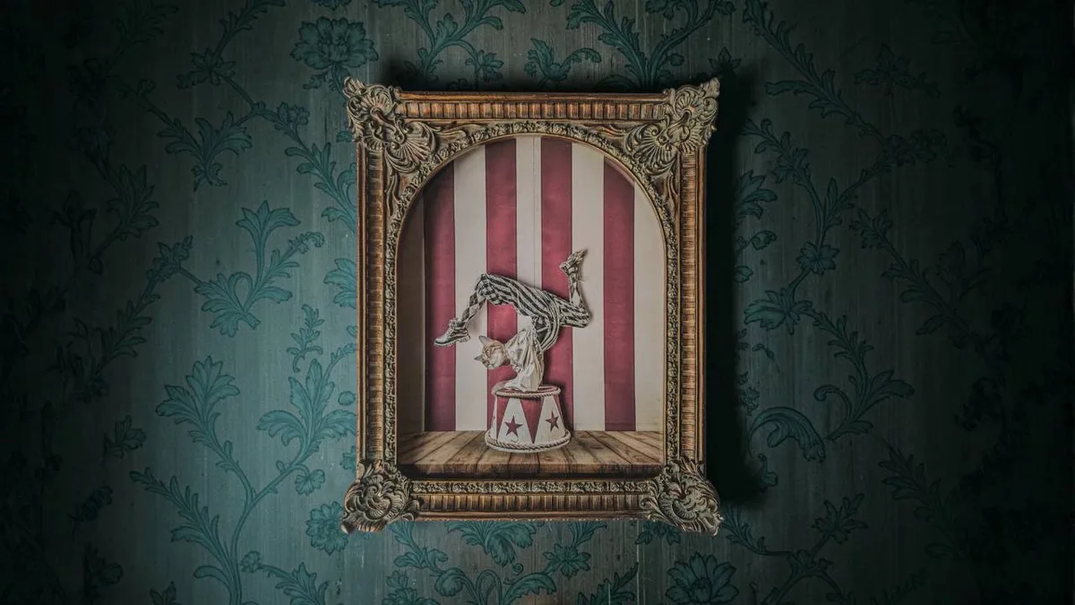 The Great Felini, a circus cat in a gilded frame