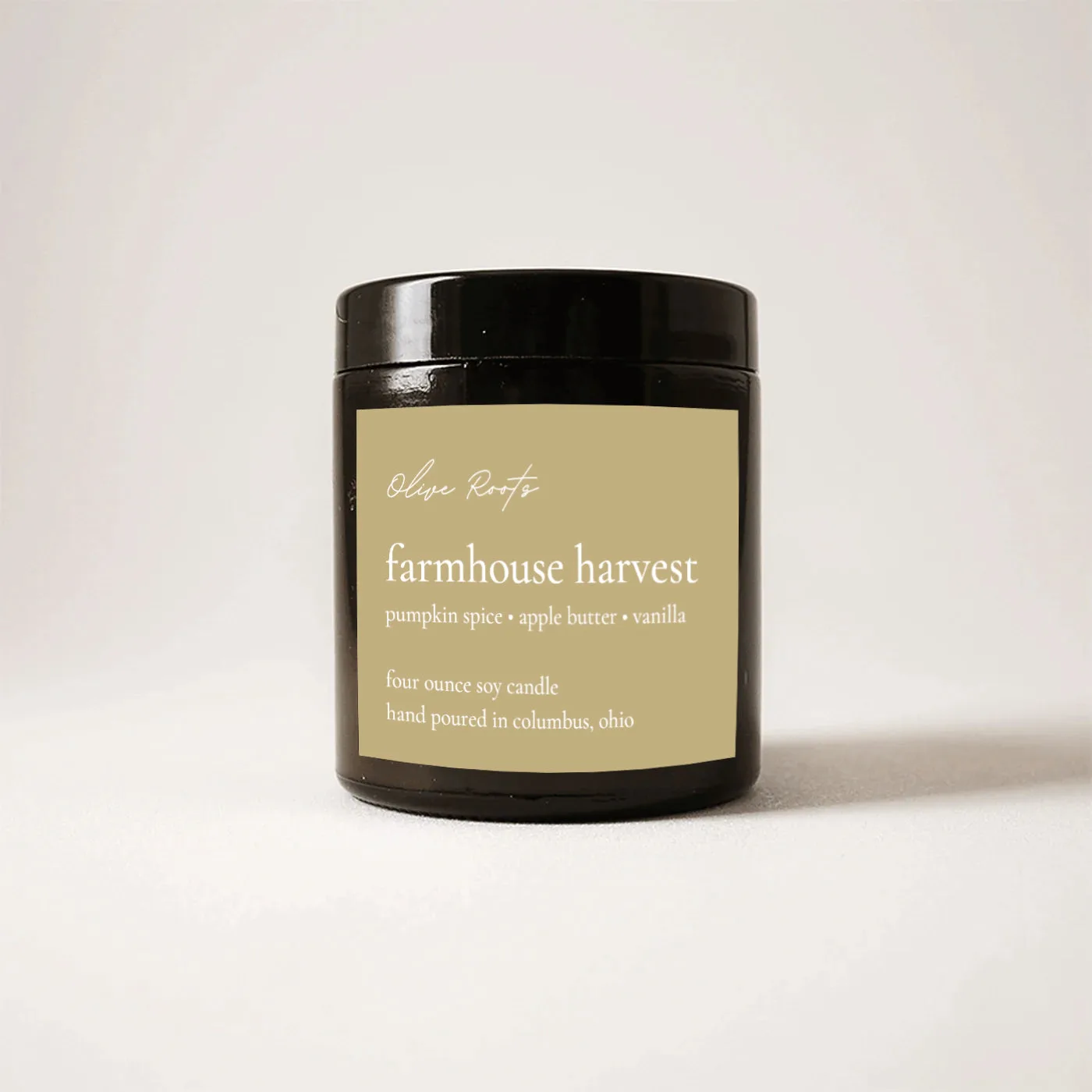 Farmhouse Harvest soy candle in an amber jar