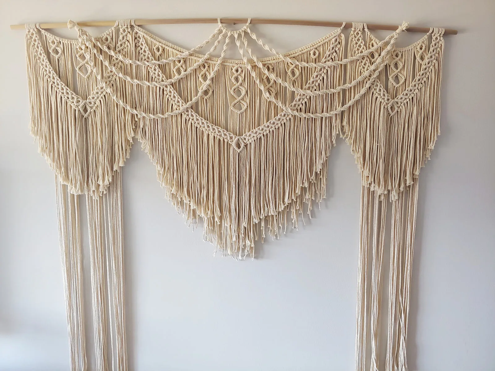 The Archway macrame backdrop, a Quality&Quinn event rental