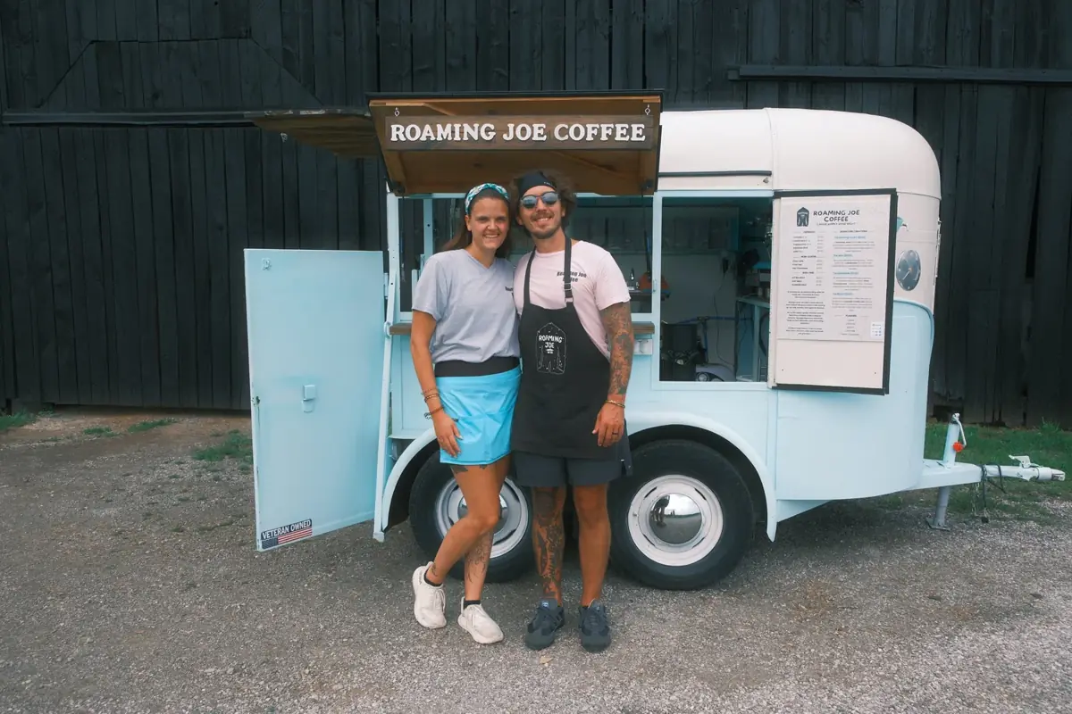 Adam and Shannon Doty in front of the Roaming Joe Coffee trailer