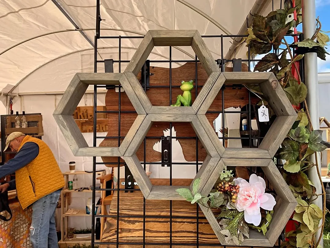 Hexagon honeycomb shelves of repurposed wood