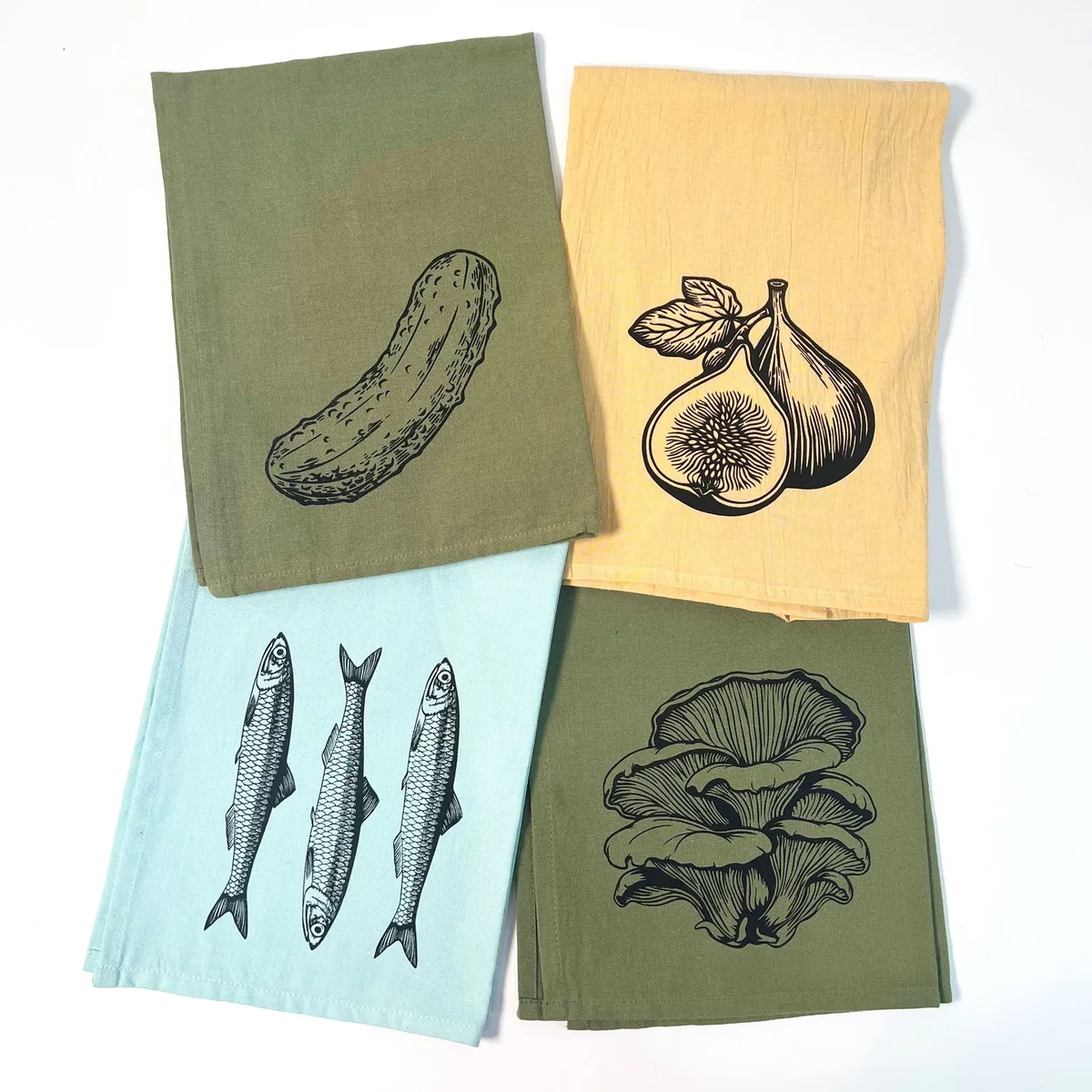 Screen-printed tea towels: a pickle, figs, sardines and mushrooms