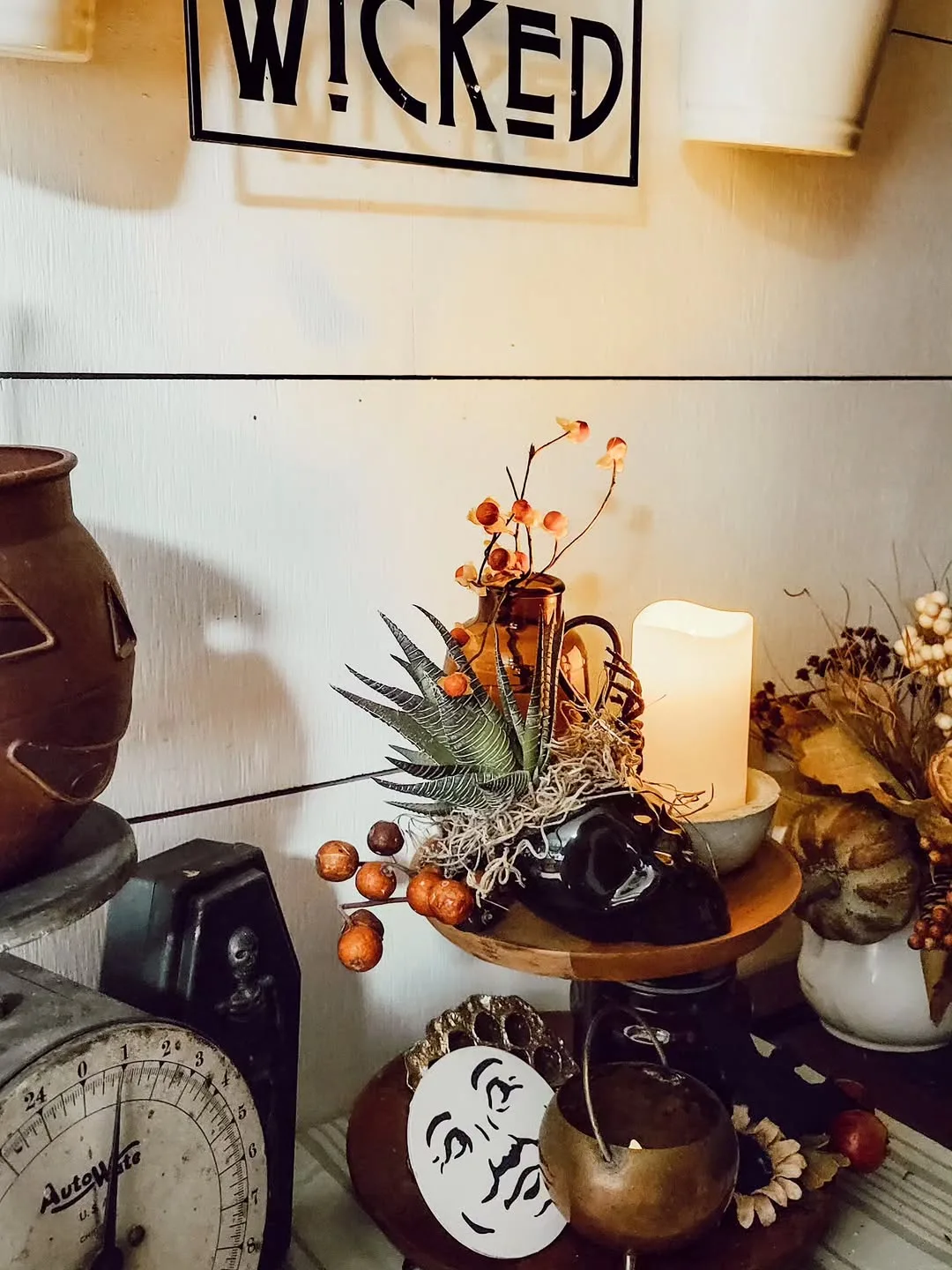 Vintage Halloween finds: a mini copper cauldron and a man-in-the-moon piece