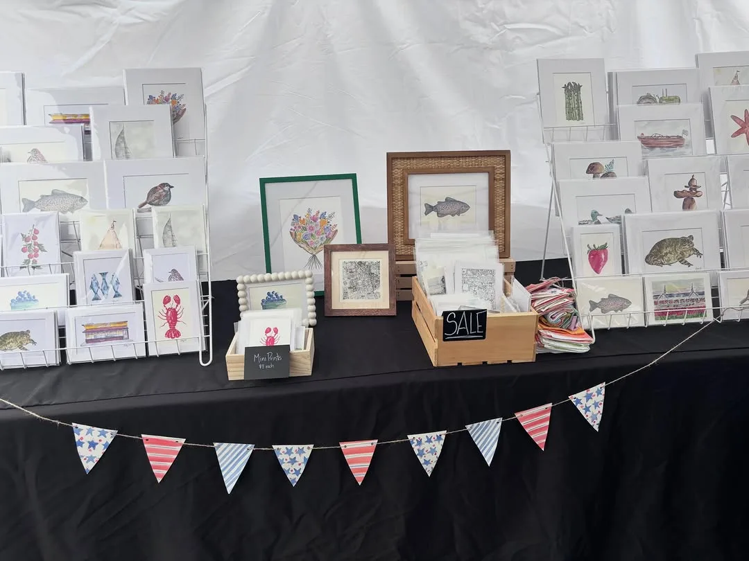 The Studio by Audrey Keyes market table: framed watercolors and cards
