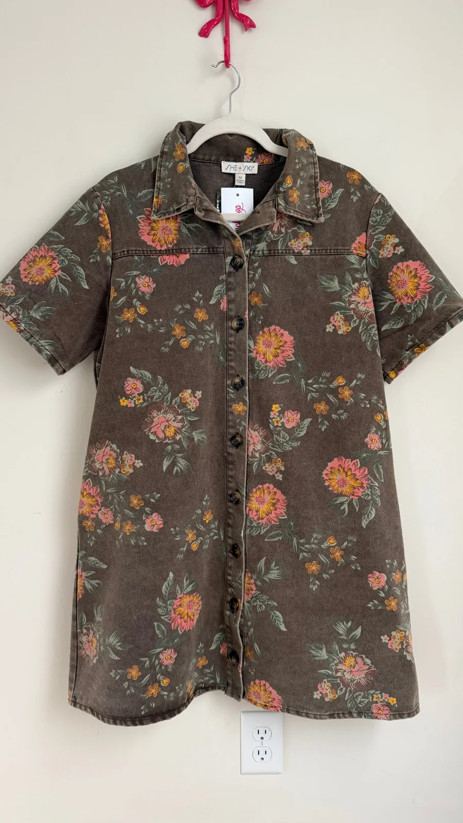 A floral button-down shirt dress